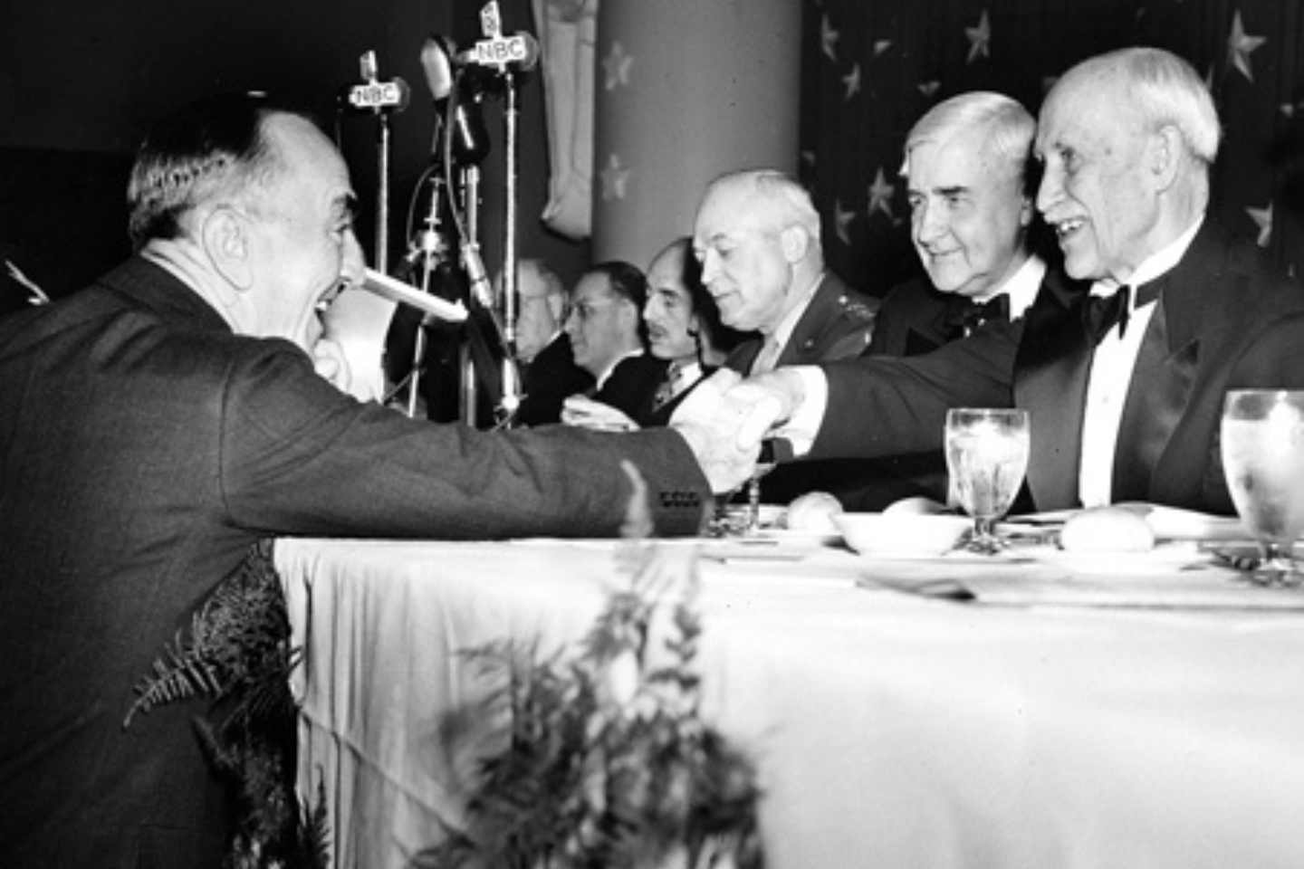 Captain Eddie Rickenbacker shakes hands with Orville Wright